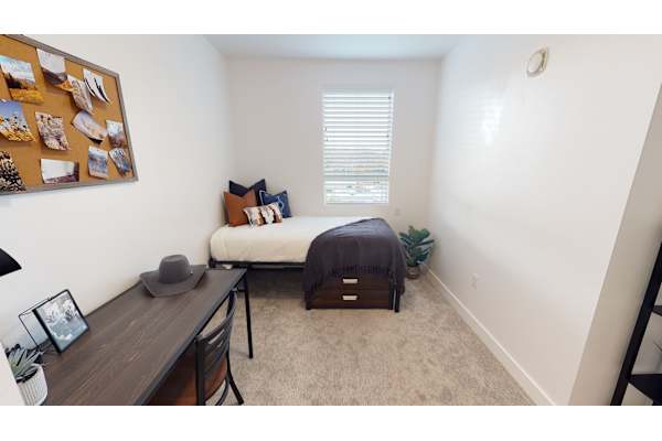 Fresh bedroom with clean white walls at 605 Place Student Housing & Co-Living, Utah